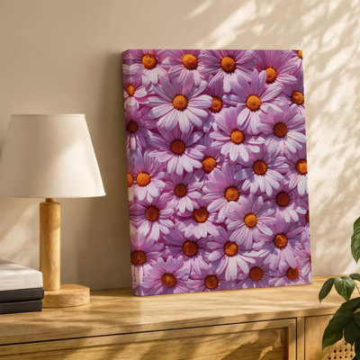 Toile, un gros plan dense d'un arrangement dense de marguerites roses, chaque fleur mettant en vedette des pétales délicats rayonnant vers l'extérieur avec toile murale