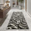Tapis à motif imprimé animal noir Dondre-22790677