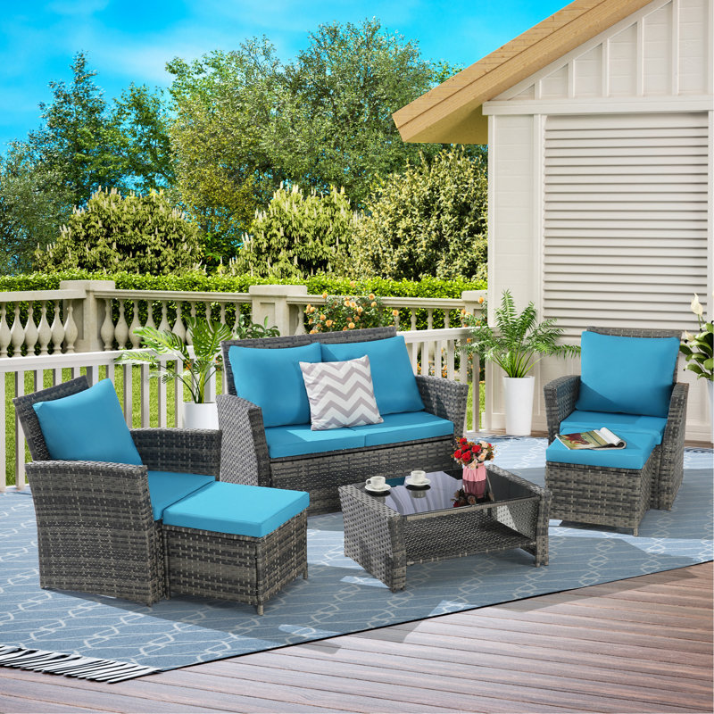 Ensemble de meubles de patio en osier 6 pièces avec repose-pieds et table basse en verre trempé, Bleu clair