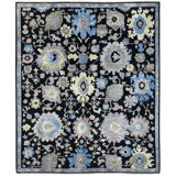 Harshang Floral Area Rug in Black