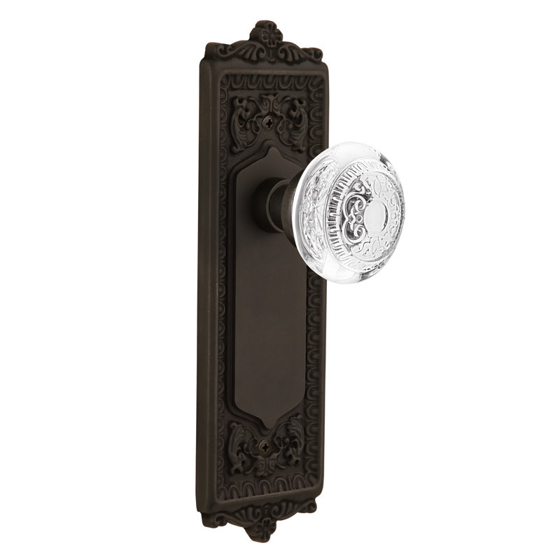 Plaque avec œuf et fléchettes, 2 3/8 po, Bronze frotté à l'huile