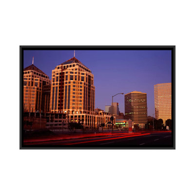 California, Oakland, Alameda County, New City Center, Buildings Lit Up at Night - reproduction de photo sur toile tendue