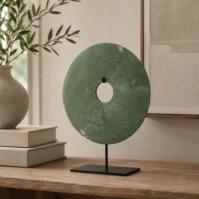 Sculpture en disque de jade avec base