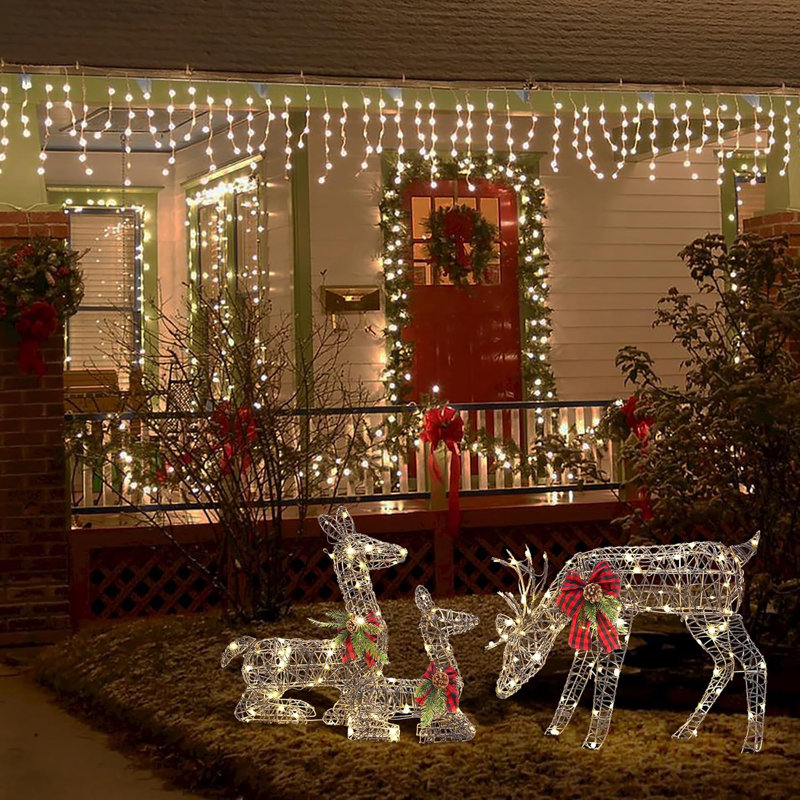 Renne en rotin illuminée de Noël