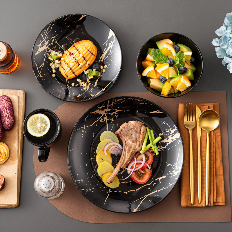 Black and Gold Splash Porcelain 16-Piece Dinnerware Set