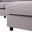 Luxueux canapé modulaire convertible avec méridienne réversible, parfait pour les espaces de vie modernes et confortables.