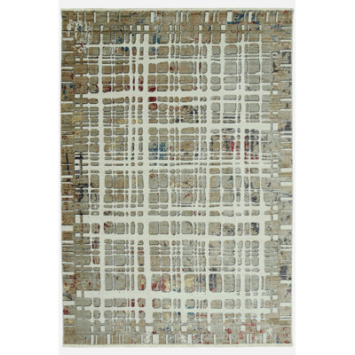Tapis abstrait ivoire 5 pi x 8 pi Dhurrie
