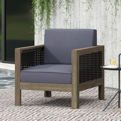Fauteuil club d'extérieur en bois d'acacia avec accents en osier