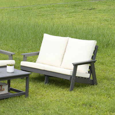 Canapé d'extérieur avec coussin