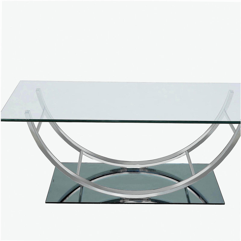 Table basse chromée à dessus en verre en forme de U