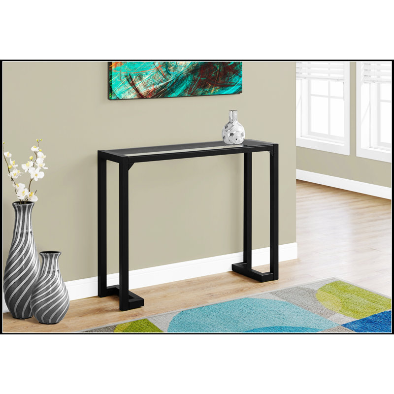 Console étroite avec plateau en verre trempé transparent et structure en métal noir pour les entrées et les canapés