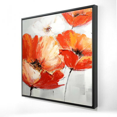 "Fleurs sauvages rouges dans le vent"