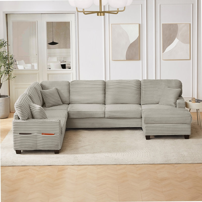 Canapé modulaire polyvalent en forme de U avec repose-pieds mobile et poches de rangement latérales, parfait pour les salons modernes