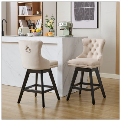 2 tabourets de bar rotatifs en velours avec garniture cloutée