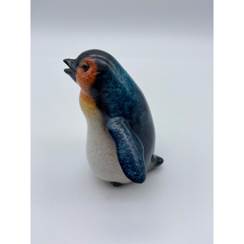 Figurine glacée petit pingouin heureux