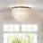 Aslak Tiered Antique Bronze Capiz Flush Mount Ceiling Light with Shell Accents-1613347185