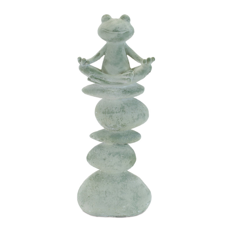 Statue de yoga grenouille sur pierre