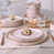 Rose clair avec bordure brune