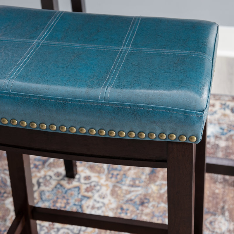 Tabouret de comptoir et de bar en bois massif sans dossier avec siège rembourré Bartonville, Bleu similicuir / Brun foncé