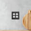 Ageless Iron Double Duplex Outlet Cover in Black Iron