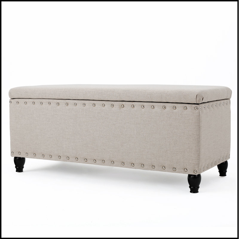 Repose-pieds élégant et durable avec compartiment de rangement dissimulé, parfait pour organiser et rehausser le décor de n'importe quelle pièce.
