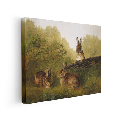 Lapins sur une bûche