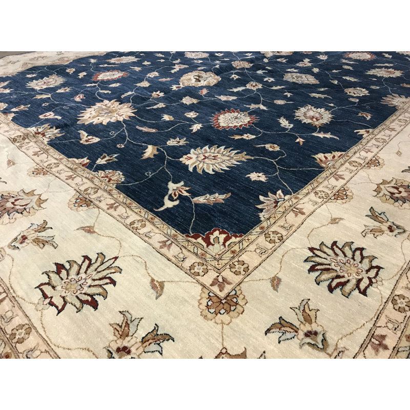 Tapis bleu et ivoire de haute qualité noué à la main