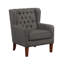 Fauteuil à oreilles classique avec dossier capitonné, revêtement gris foncé et pieds en bois massif-134542007