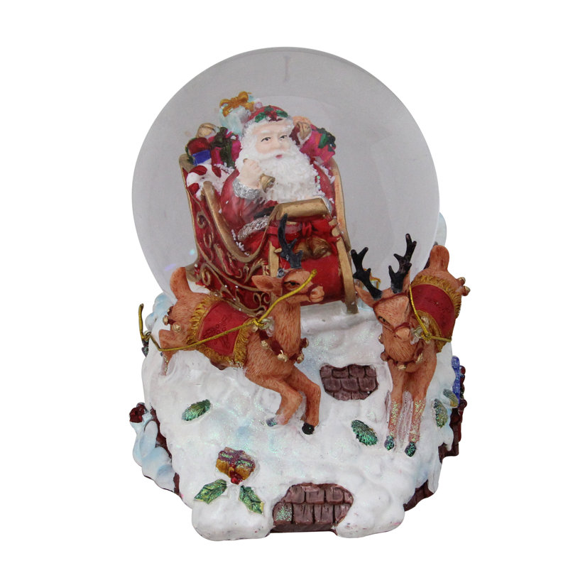 Santa Claus on Sleigh with Reindeer Musical Christmas Snow Globe