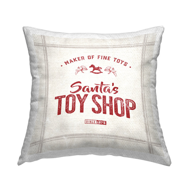 Coussin d'extérieur imprimé Santa's Toy Shop par Kelley Talent