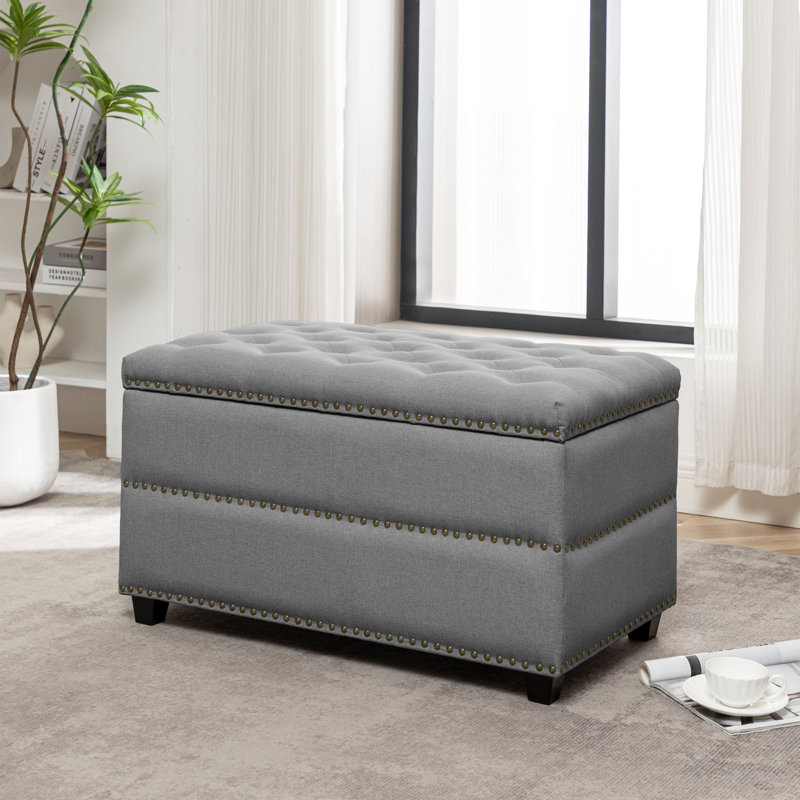 Banc de rangement en tissu avec pieds en bois Winston Porter Berg, Gris