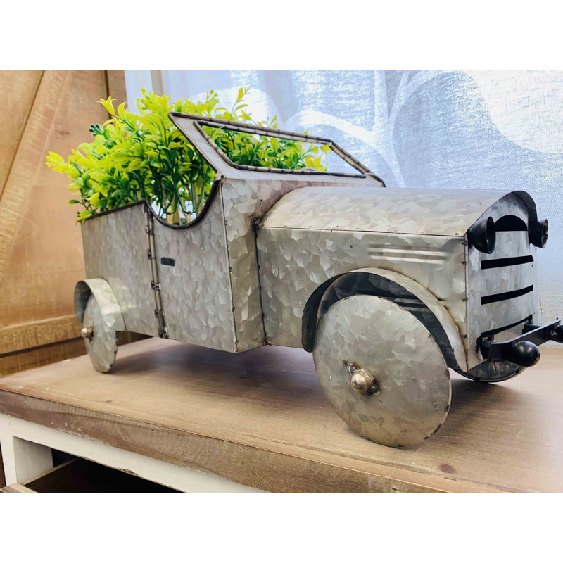 Reproduction en métal de modèle de camion avec motif floral