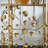 Larkynn Gold Finish Foliage Bar Cart With Mirror Top And Bottom