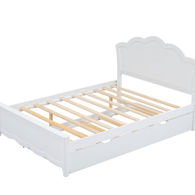 Lit plateforme en bois blanc avec tête de lit et lit gigogne simple