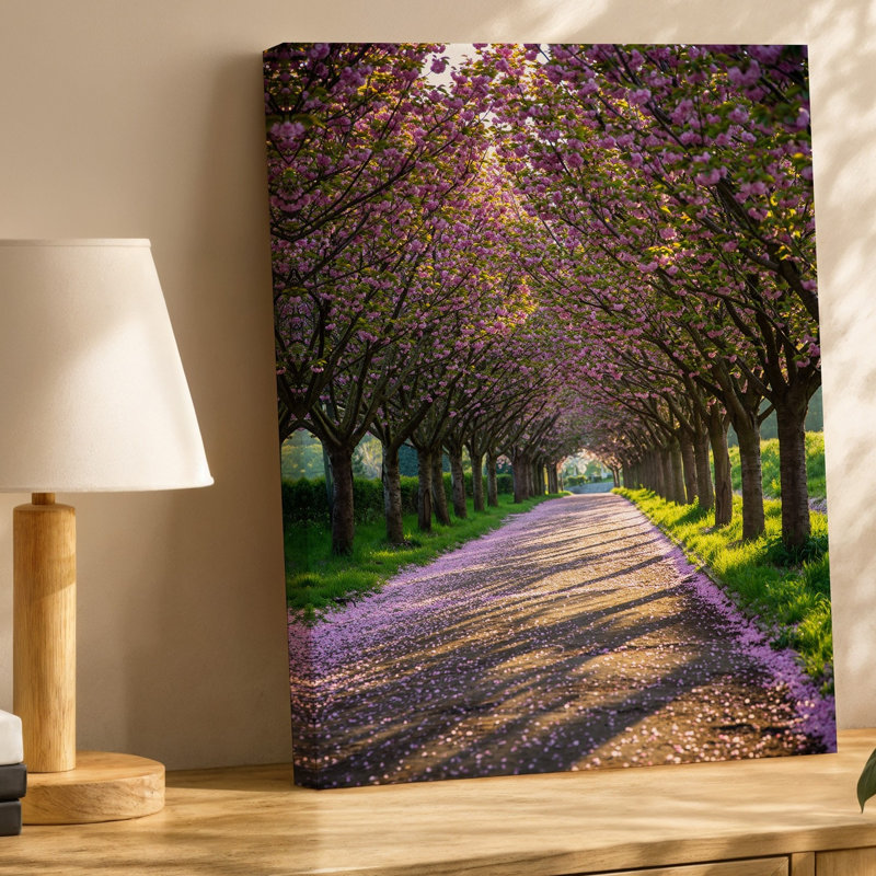 Toile, un sentier serein bordé de fleurs de cerisier luxuriantes, leur art mural est lourd avec des fleurs roses éclatantes