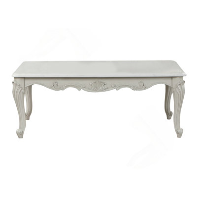 Kirsteni Solid and Manufactured Wood Rectangular Coffee Table 