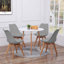 Christy 4 Person Dining set - a Round Plastic Dining Table with Wooden Legs and a Set of 4 Faux Leather Cushion Padded Dining Chairs for Dining Room - Modern Dining Table Set-718770528-718770521
