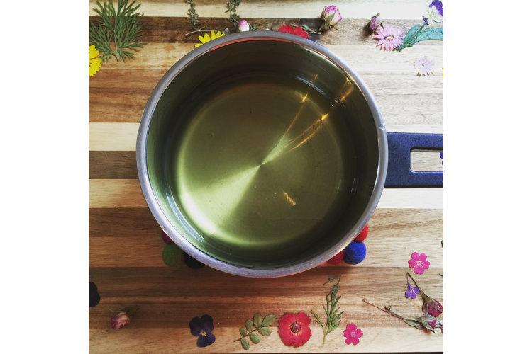 Heat the beeswax.