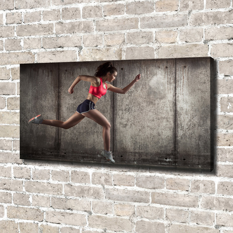 A Running Woman - Wrapped Canvas Print
