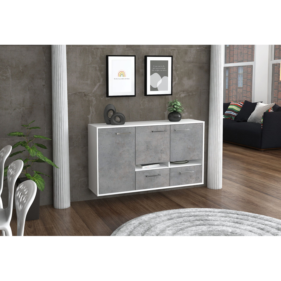 Das Sideboard Bartinus hat ein schwebendes Design und Metallgriffe