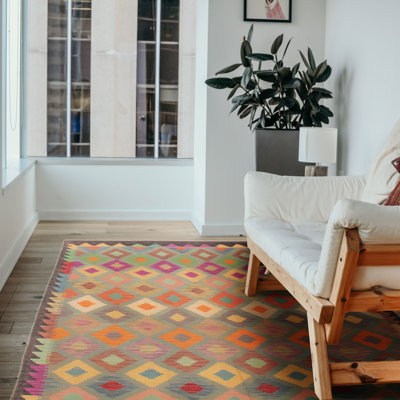 Tapis unique en orange 5 pi 9 po x 7 pi 10 po