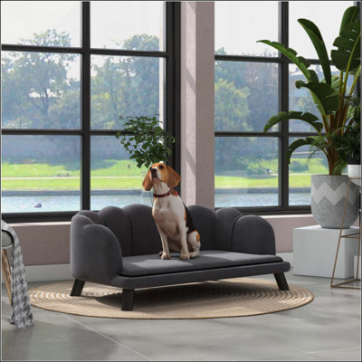 Canapé en velours pour chien avec pieds robustes en bois et coussin moelleux