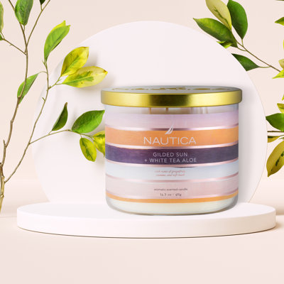 Bougie de créateur parfumée dorée au soleil et au thé blanc