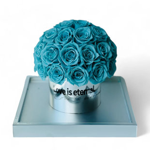 Arrangement de roses en boîte