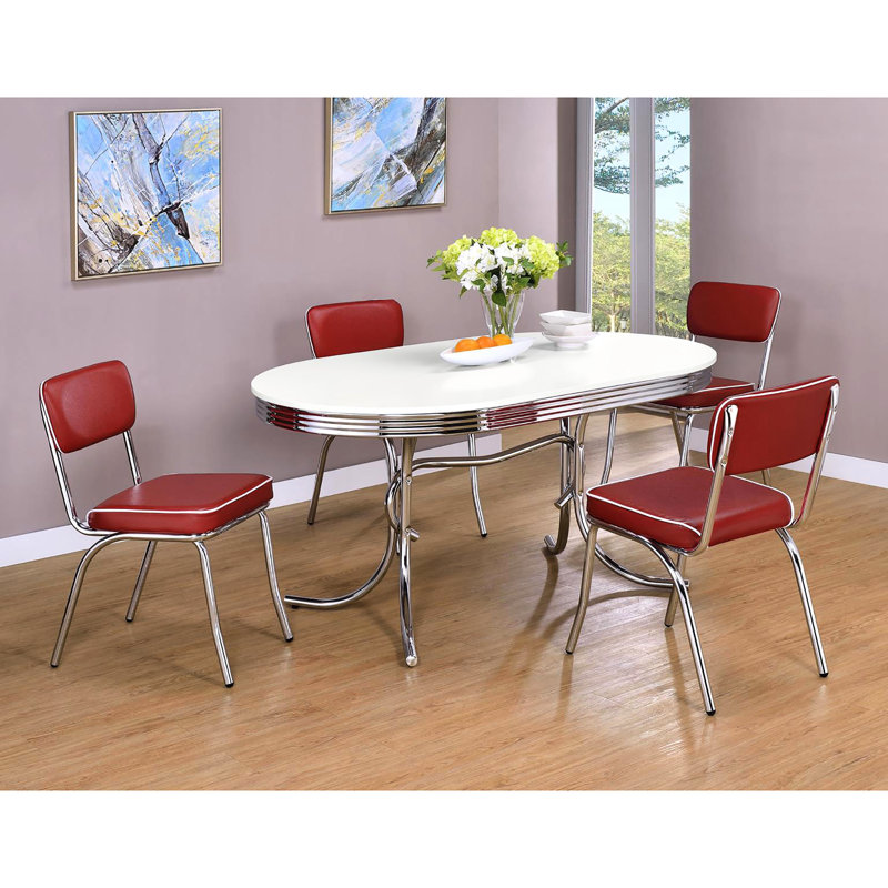 Table de salle à manger brillante et ovale en blanc qui rehausse l'attrait visuel et résiste aux charges lourdes