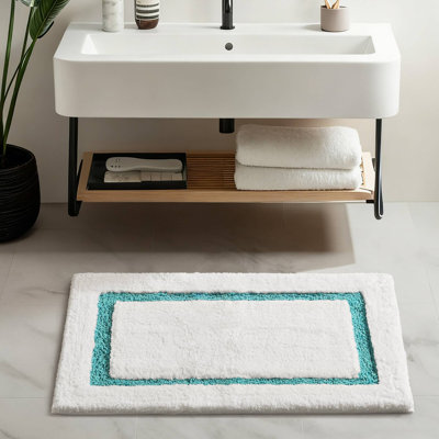 Roan Border Tufted Bath Rug