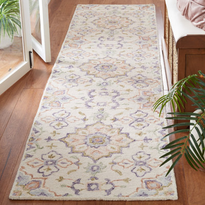 Eava Hand Tufted Wool/Cotton/Latex Oriental Rug in Green/Ivory