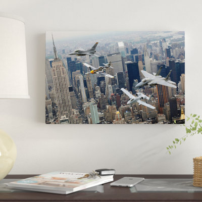 " A P-51 Mustang, F-16 Fighting Falcon, F-15 Eagle, And A-10 Thunderbolt II Fly Over New York City " Color Photography