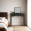 Meuble-lavabo noir avec miroir et tiroirs