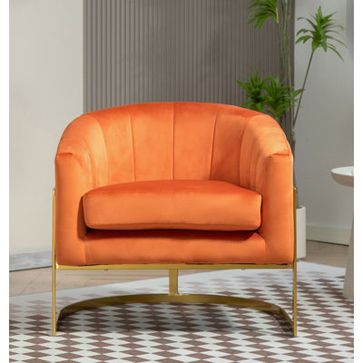 Fauteuil en velours doré